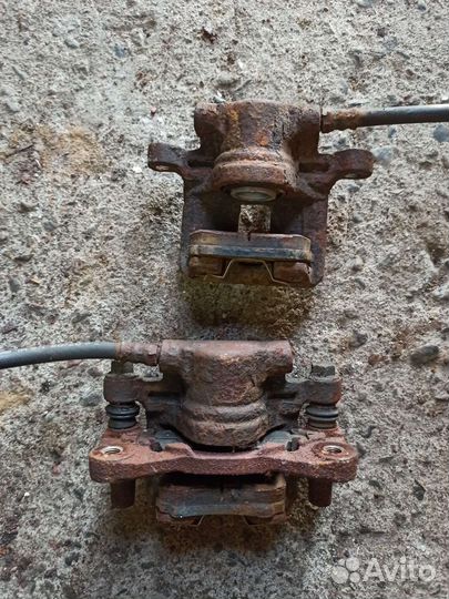 Суппорт задний Mitsubishi Lancer X 1.8 МКПП