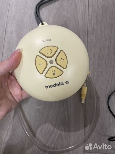 Молокоотсос medela электрический