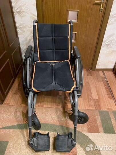 Инвалидное кресло