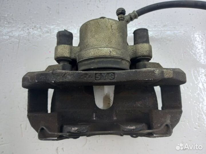 Суппорт передний правый Mazda Axela bkep LF 2006