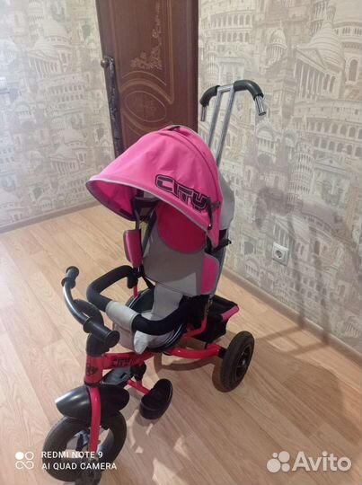 Детский трехколесный велосипед с ручкой