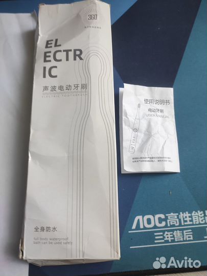 Электрическая зубная щетка