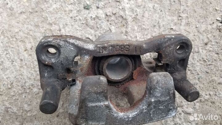 Суппорт mitsubishi lancer