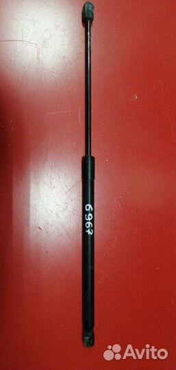 Амортизатор багажника Mazda 3