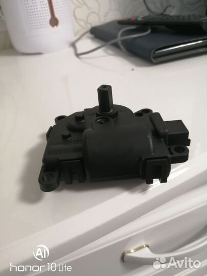 Сервопривод заслонки печки