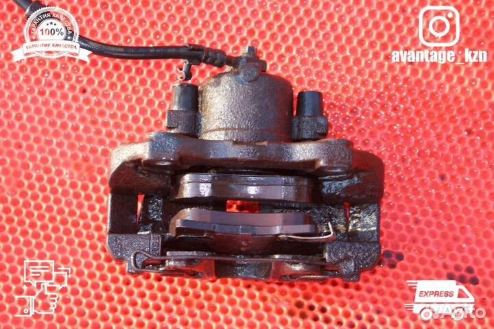 Суппорт тормозной передний левый Opel Astra H