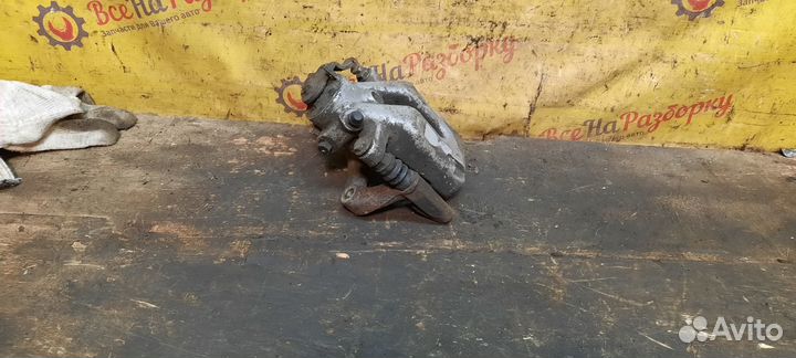 Супорт тормозной задний левый Peugeot 307