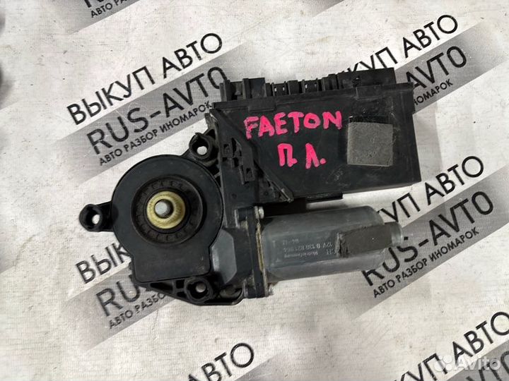 Моторчик стеклоподъемника передний левый