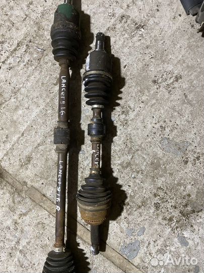 Привод левый Mitsubishi Lancer 9 1.6 МКПП