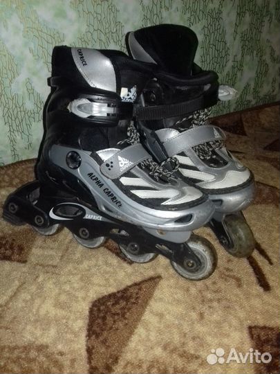 Роликовые коньки