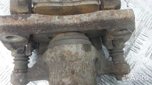 Суппорт тормозной задний правый mazda CX-7 1 (KUK0