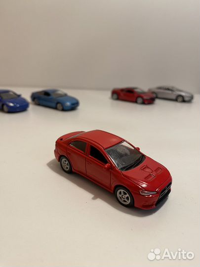 Машинки Welly