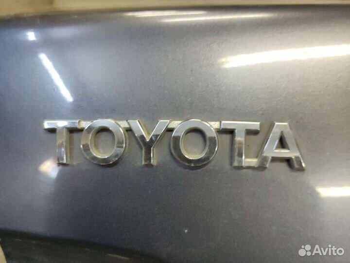 Эмблема багажника Toyota Corolla e 150