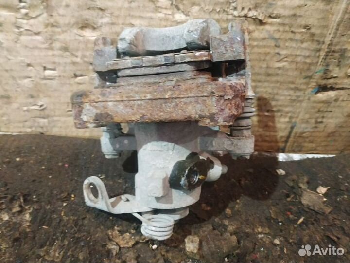 Суппорт тормозной задний правый Peugeot 408