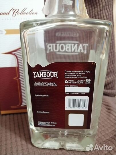 Коробка с пустой бутылкой Tanbour