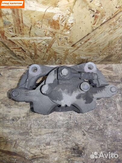 Суппорт тормозной передний левый Opel Astra J