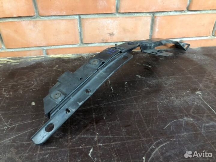 Кронштейн бампера передний левый Opel Astra J