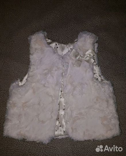 Жилетка нарядная меховая