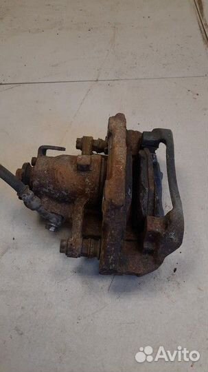 Суппорт тормозной задний левый Ford Edge