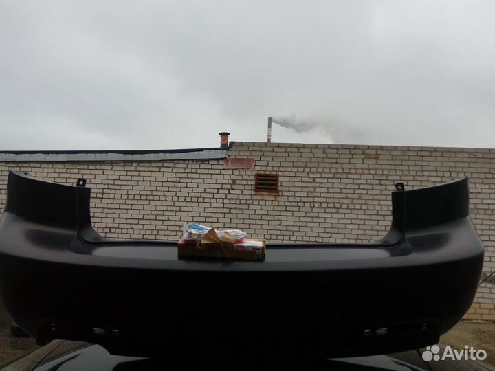 Задний бампер mazda 3 2009 (Новый)