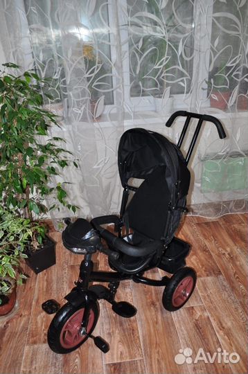 Велосипед коляска с ручкой в отличном состоянии