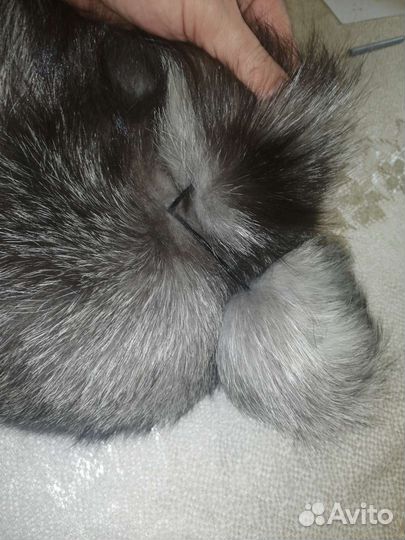 Женские меховые шапки