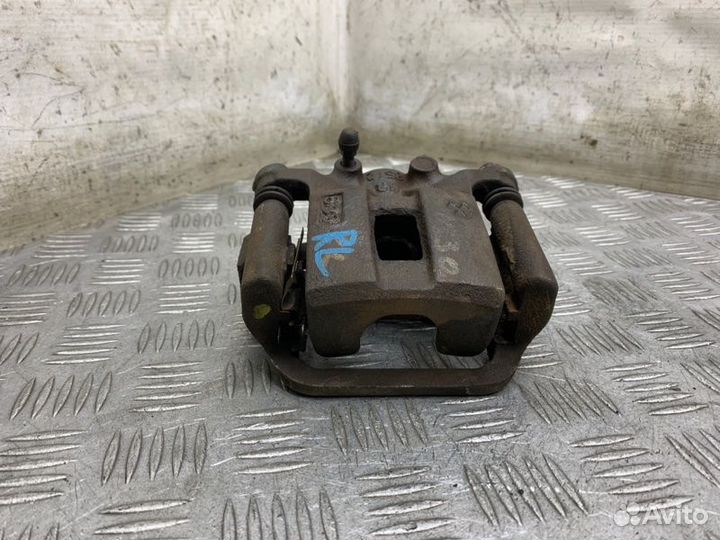 Суппорт тормозной задний левый Nissan X-Trail T30