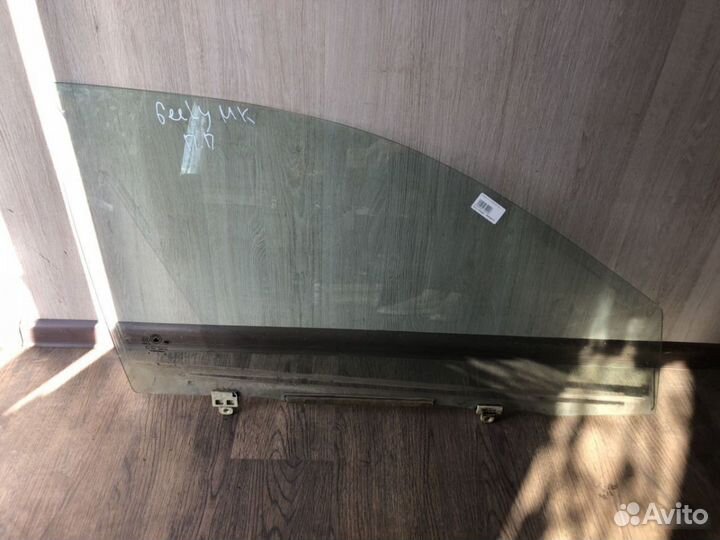 Стекло двери передней правой Geely MK