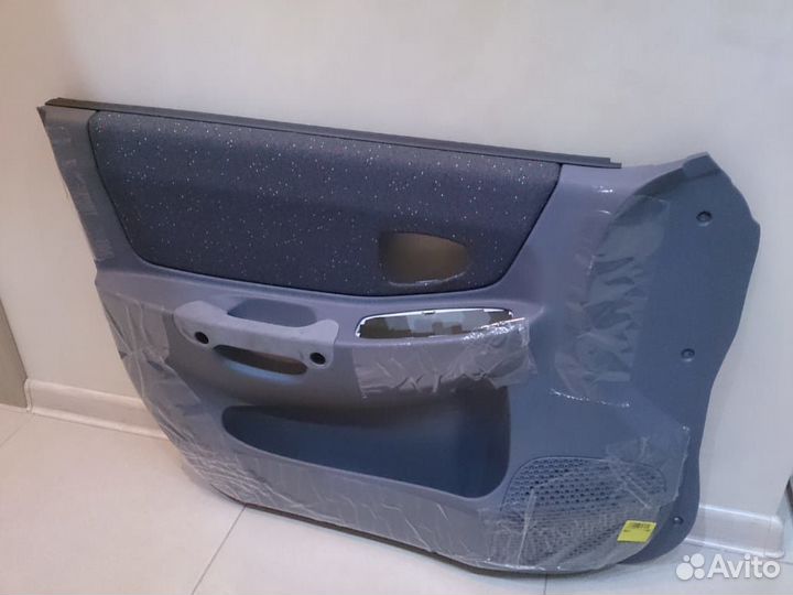 Обшивка двери Hyundai Accent тагаз