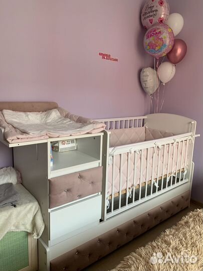 Детская кроватка с маятником