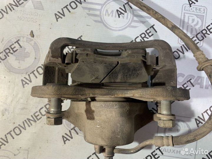 Суппорт тормозной передний левый Kia Ceed 1 ED