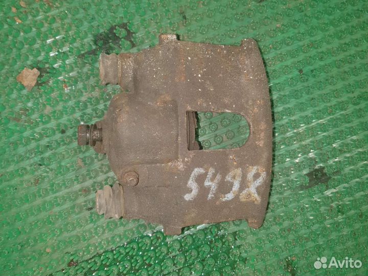 Суппорт тормозной передний пр Додж Стратус 96-00