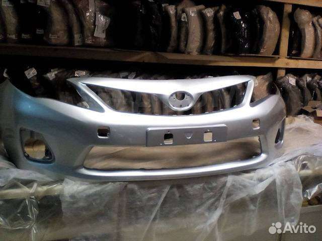 Бампер передний Toyota Corolla E150 серебристый