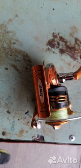 Катушка рыболовная Akara