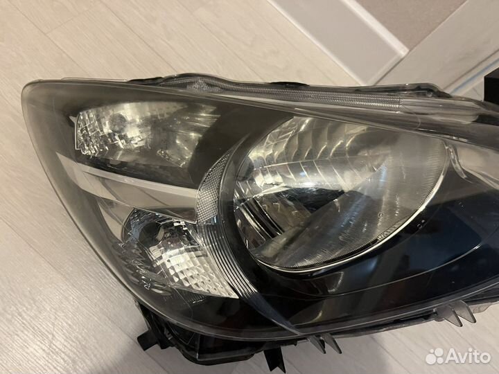 Фара левая + правая Mazda Demio DJ 10018368