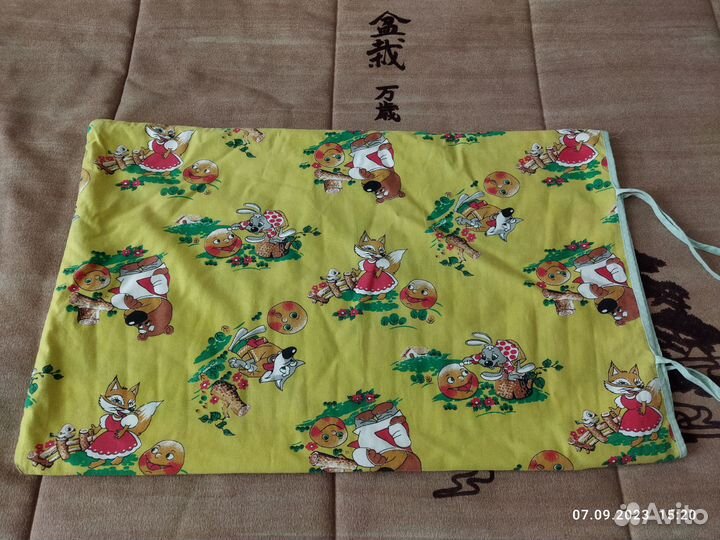 Детское одеяло и подушка в кроватку