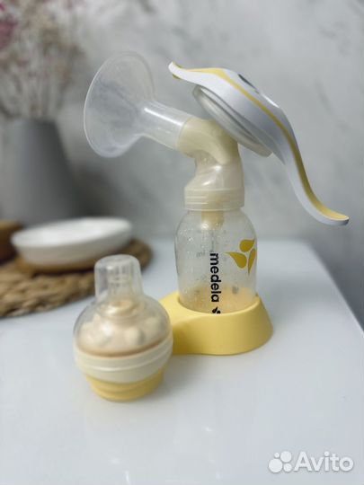 Молокоотсос medela ручной
