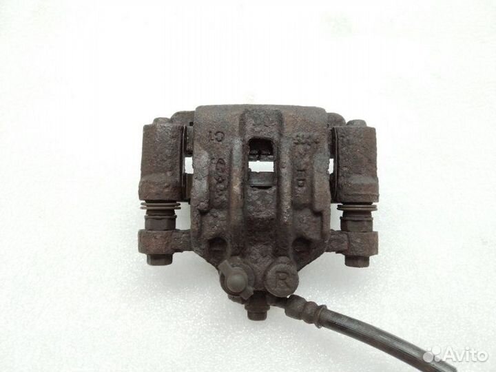 Суппорт тормозной задний правый Kia Ceed ED G4FC