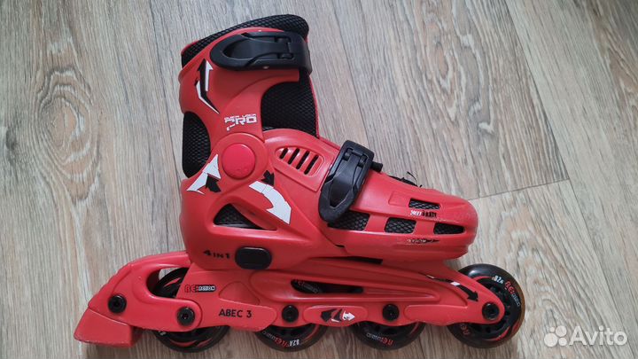 Роликовые коньки