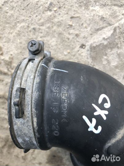 Патрубок воздушного фильтра Мазда Сх7 CX7