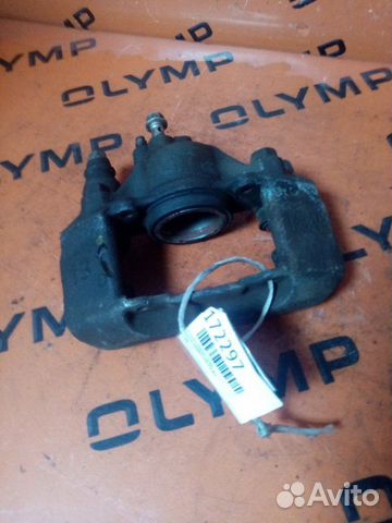 Суппорт передний правый Mazda Demio DW3W B3