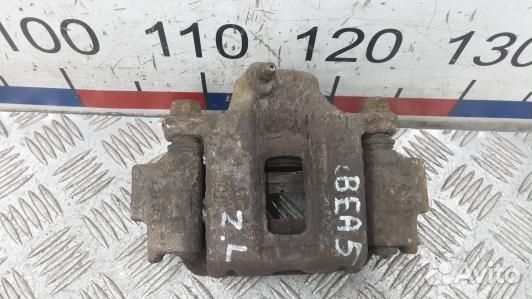 Суппорт тормозной задний левый toyota land cruiser