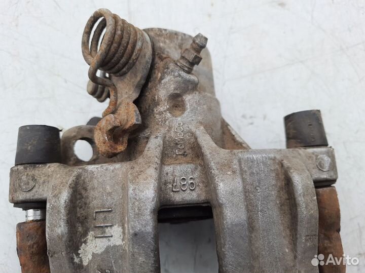 Суппорт задний левый Форд Фокус 2