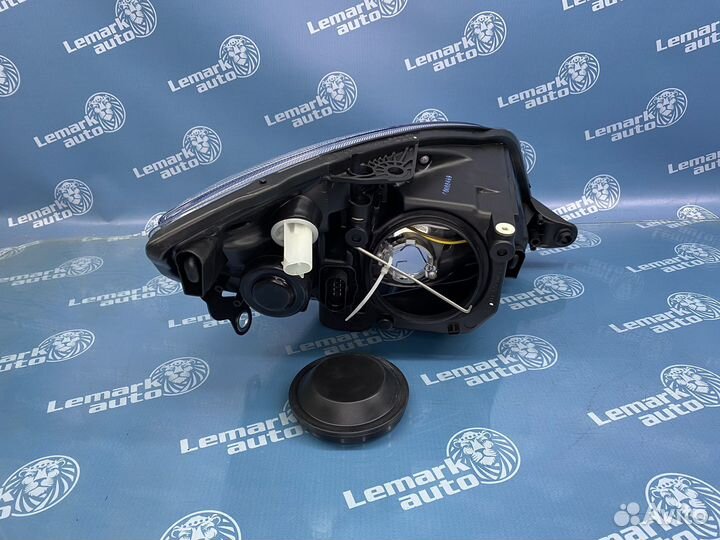 Фара левая Skoda Fabia, Roomster до 2010