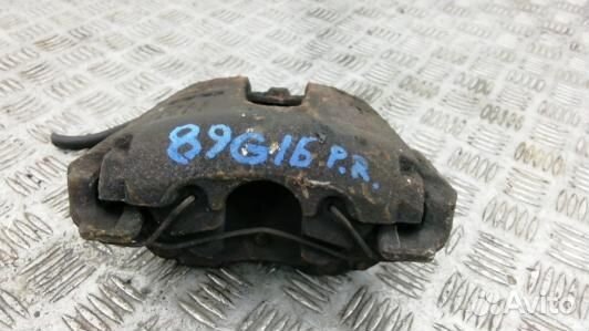Суппорт тормозной передний правый mazda 3 1 (89G16