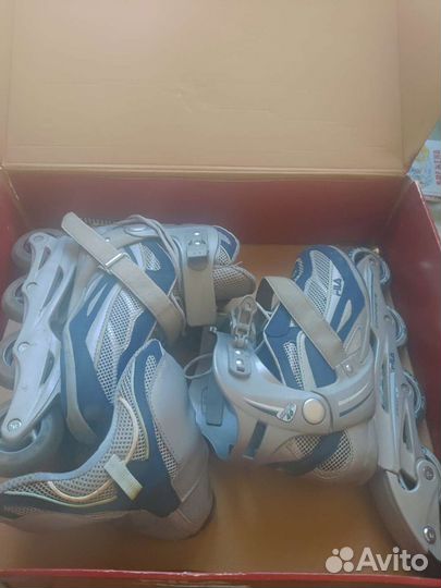 Роликовые коньки