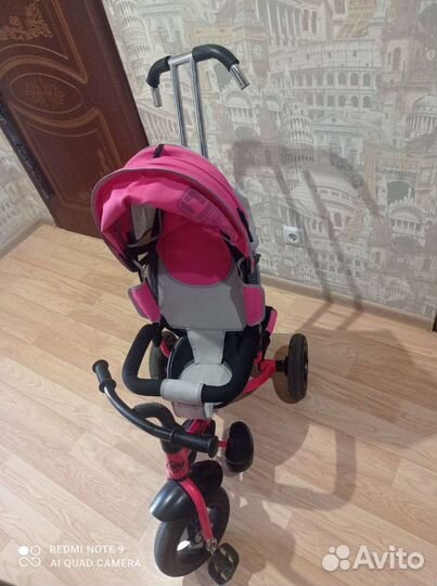 Детский трехколесный велосипед с ручкой