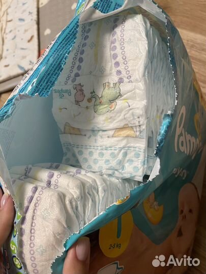 Подгузники Pampers и Merries