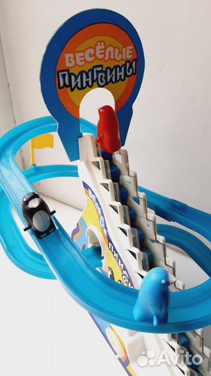 Игрушка механическая Весёлые пингвины 1996