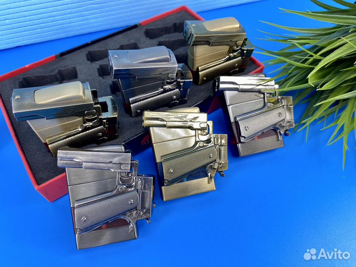 Зажигалка кремневая в виде складного пистолета